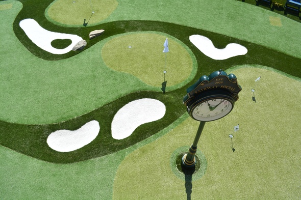 Atlanta Synthetic grass golf course with sand traps and golfers